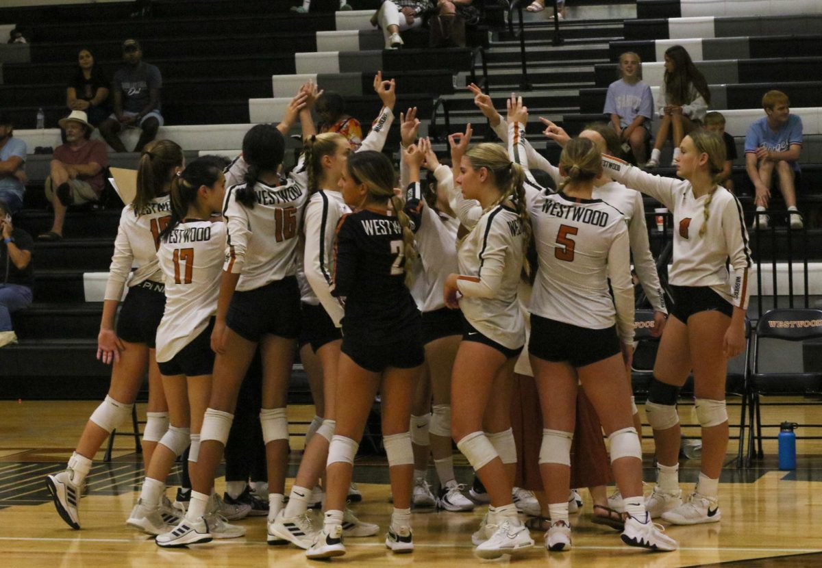 The Lady Warriors hudling up and rejoicing for their new win. The JV Orange Volleyball team went up against the Gateway Gators and came out victorious. "The best thing about Westwood Volleyball is seeing everyone come together , not only at games but on the bus, in school, and even practice" Trinity Osmer '26 said.  