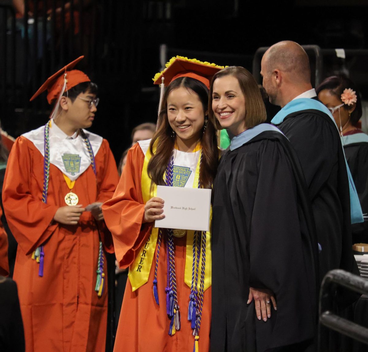 Beaming, Salutatorian Bailey Zhang '25 and Principal Erin Campbell pose for a photo. Zhang delivered a speech to her fellow graduates, and will be attending Stanford University this fall on the pre-medicine track.
