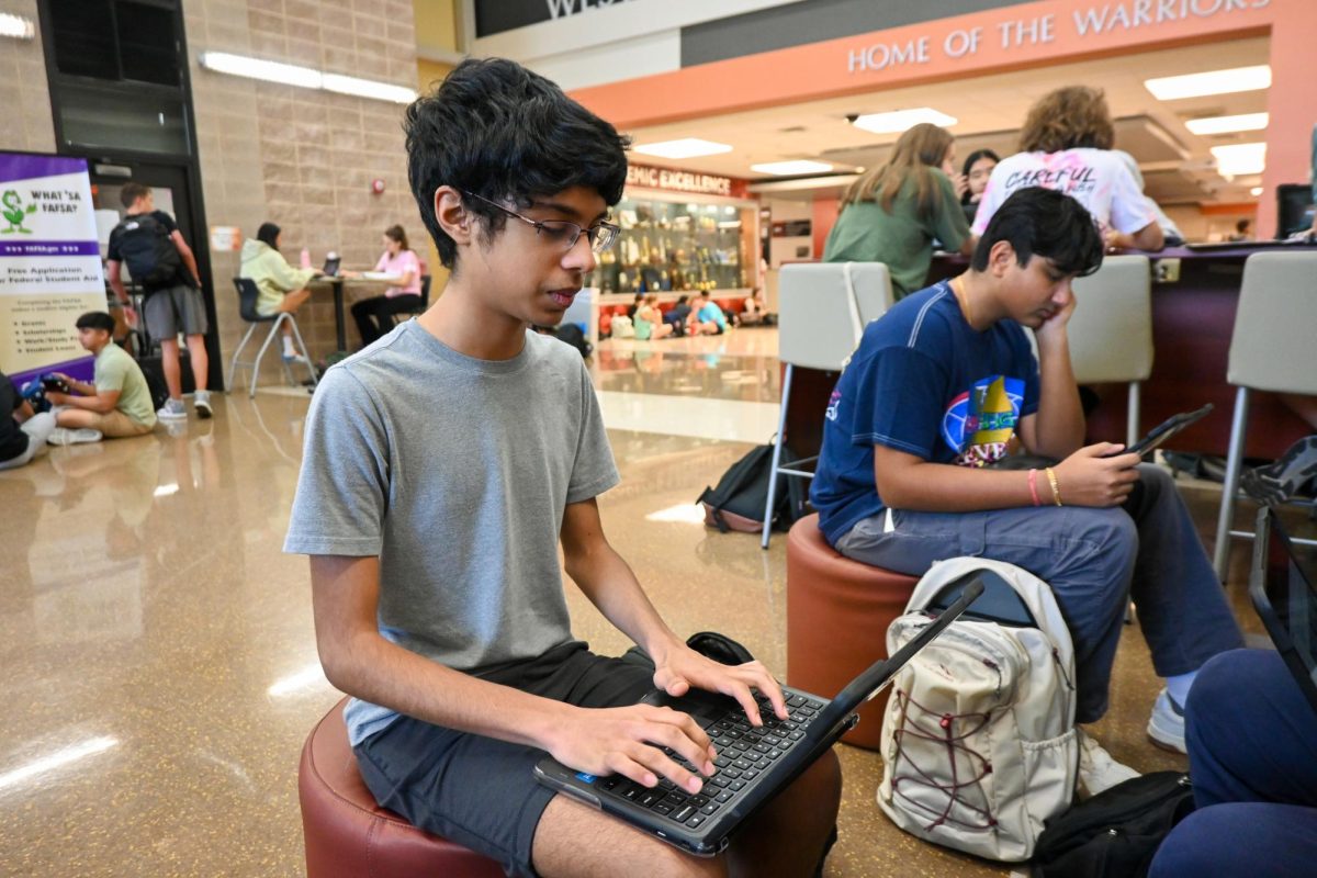 Sitting in the atrium, Siddhant Kameswar '27 practices his programming. Before UIL Computer Science competitions, Kameswar frequently spent any spare time preparing for a weekend of coding. "Compared to normal coding, UIL is more problem-solving than software. I look for problems that could be solved and then I try to make projects that solve those problems," Kameswar said. 