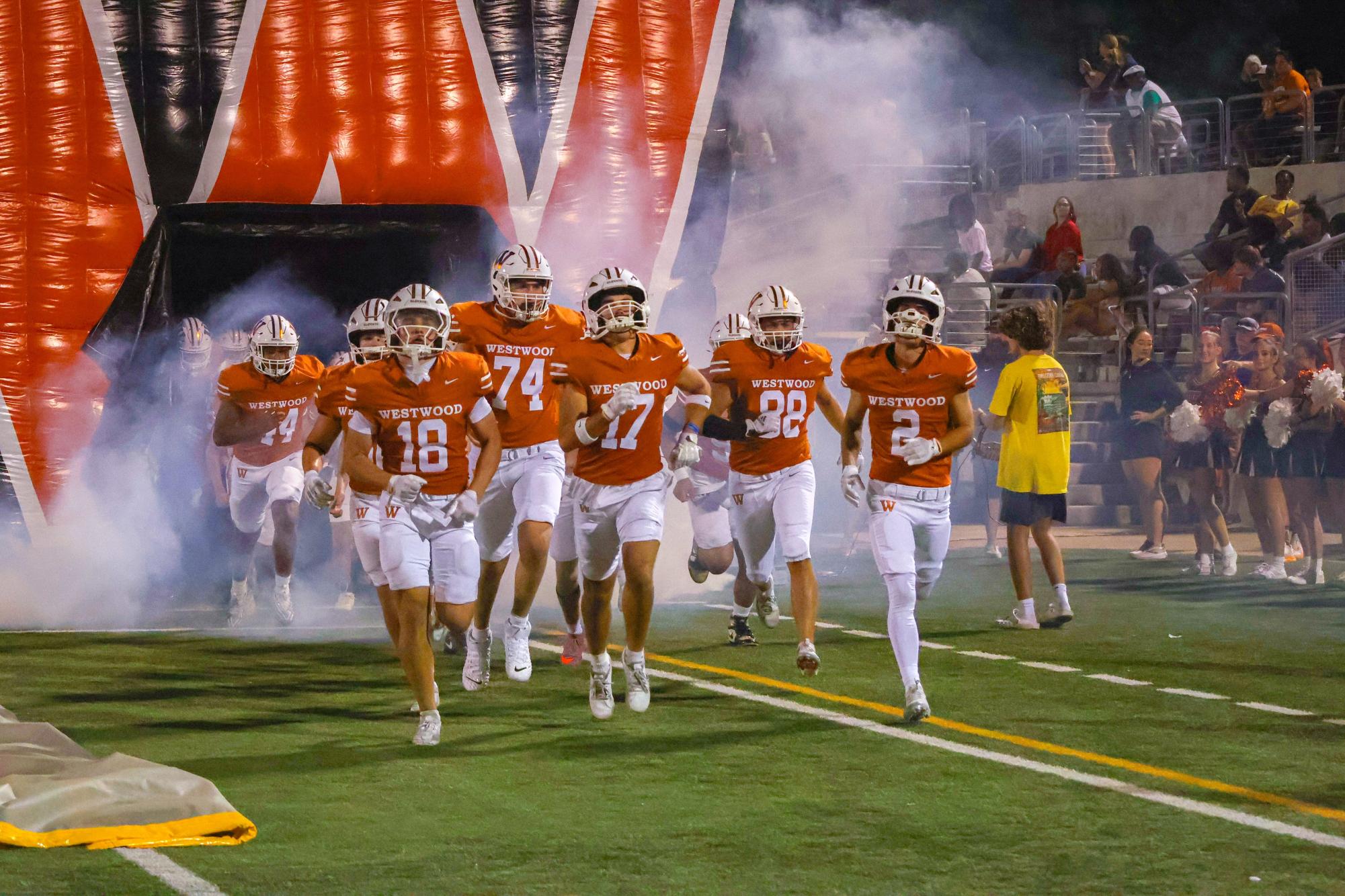 Bolting onto the field after halftime, juniors Ryan Edson and Canon Olofson lead the team continue fighting the Austin High Maroons. The Warriors came back with renewed energy and determination to fill in the gaps in offensive strategy.