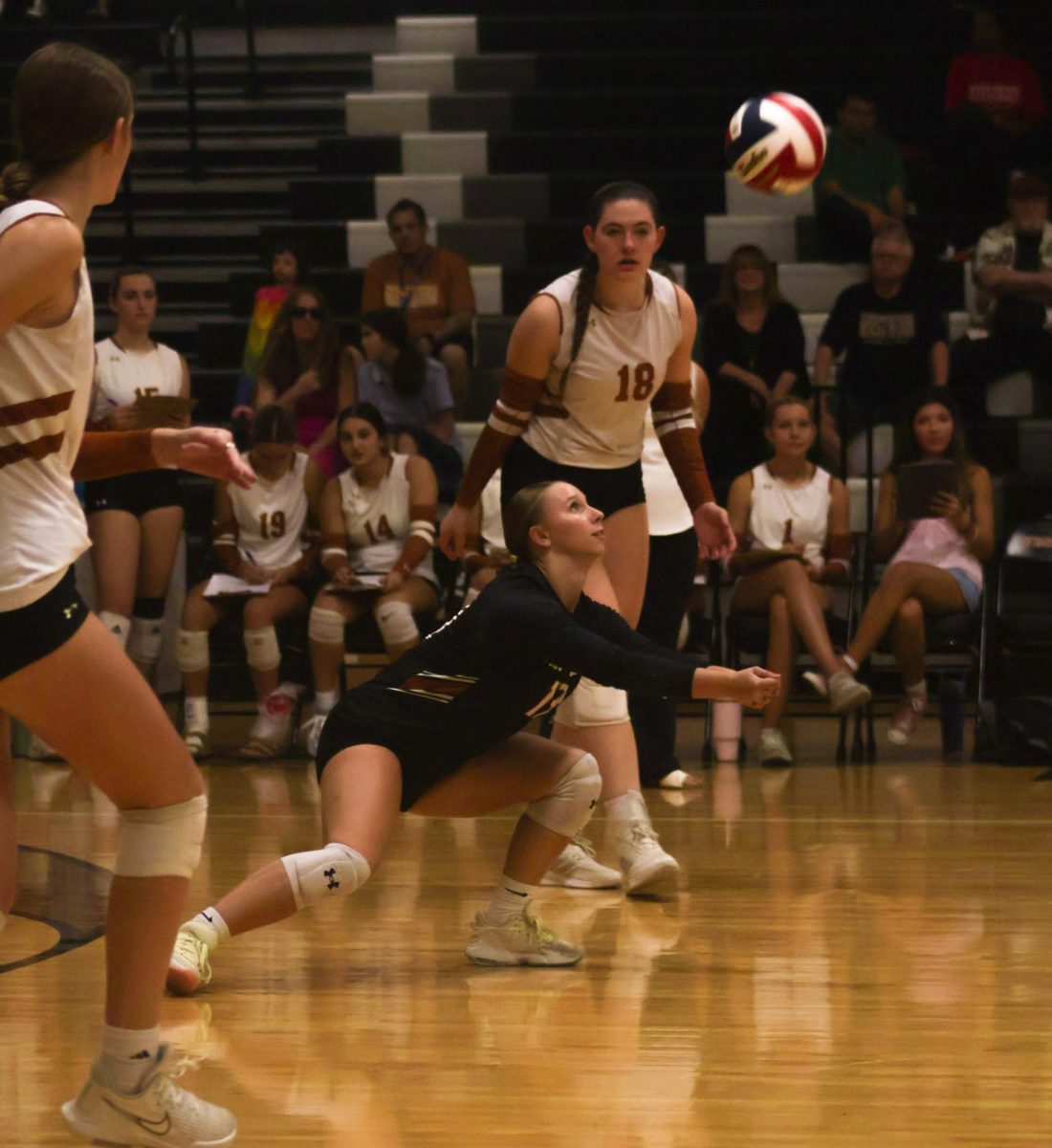Eyes locked, with sharp concentration Dakota Hodge '26 leans to break a serve coming from the Round Rock Dragons side of the net. As a libero, Hodge's job is to dive for difficult digs and break strong serves from the opposing team. "My position is literally all reading of the hitter's hands, arms, and where the ball is placed," Hodge said.  