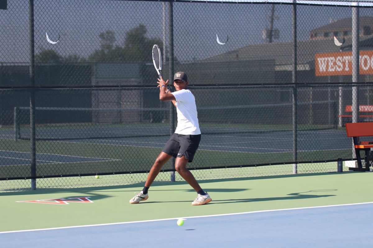Shardul Pandit '26 gets ready to hit an incoming ball. Pandit won this tiebreaker match and secured his victory with a score of 8-7.