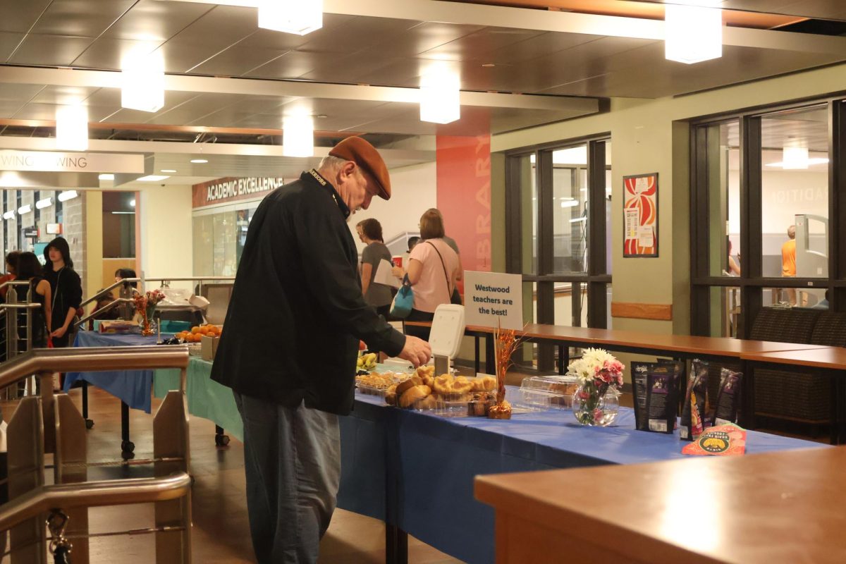 During PTSA's organized event, faculty members pick up breakfast items during Teacher Appreciation Week. PTSA provided a wide range of cuisines for the teachers to start their day.