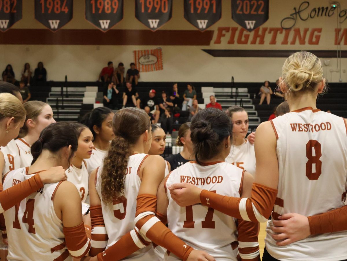 Huddling together during a time out, Zoey Sinitsky '27, Claire Toupin '27, Harlow Hernandez '27, and Piper Evans '27 decide the attacks they will use on the Vista Ridge Rangers. They had to come up with tactics to use quickly and efficiently because their scores were head to head with each other. 