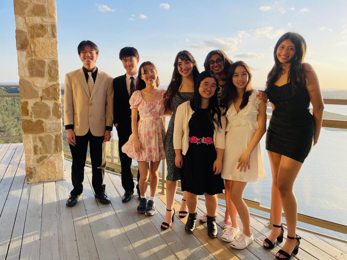 Anticipating the upcoming event, sophomore class StuCo officers pose with bright smiles after setting up for prom. Working for many months in preparation for the event, StuCo officers prioritized making prom an engaging and enjoyable night. 