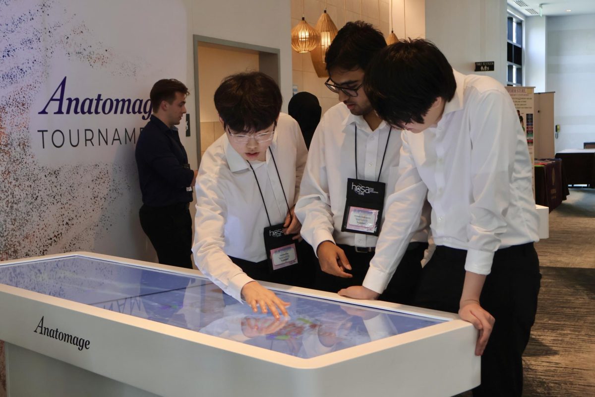 Identifying each anatomical structure, seniors Minsung Kim, Kritanko Chakraborty, and Harry Liu participate in the Anatomage Tournament. The Anatomage Tournaments are 3D academic competitions that blend gaming and learning, allowing students to deepen their understanding of anatomy.