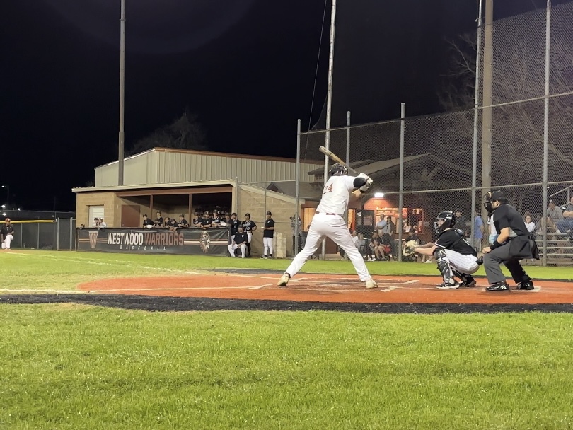 Prepared to step into his swing, Jacob Wright '25 faces the Vandegrift pitcher in the first game of the season. Wright was up to bat in the bottom half of the sixth inning but ended up striking out. 