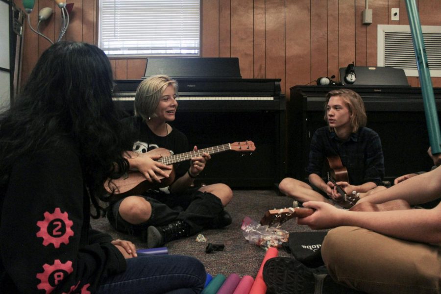 Sydney True '26 talks about their playing experience as the group looks to play some tunes. Some members used plastic percussion instruments to participate without an instrument.