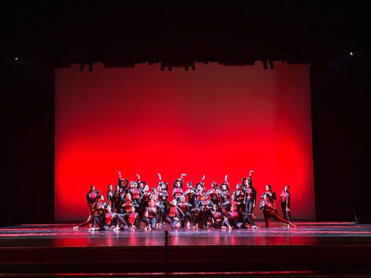 Warrior Pride strikes their final pose as they conclude their jazz routine.