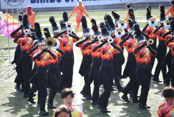 Standing in the fields, Band performs Birds on a Wire for judges and the audience at BOA Austin.